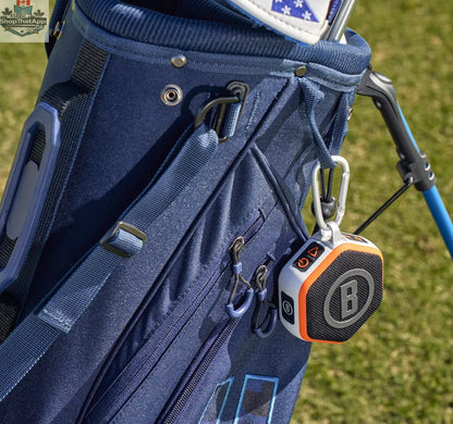 Bushnell Golf Wingman Mini GPS speaker showing its compact design and golf course map display.