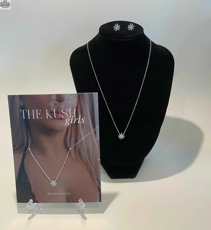 Silver cannabis leaf necklace featuring a detailed cannabis leaf pendant, stylish jewelry accessory by The Kush Girls.