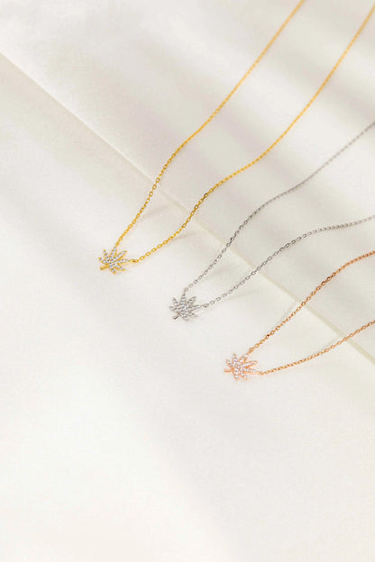 Silver cannabis leaf pendant necklace by The Kush Girls, featuring a detailed cannabis leaf charm on a sleek chain.