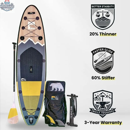 Inflatable Peyto 10' paddleboard by The Wild Tribe, shown on water with paddle, ready for water adventure and recreational paddling.