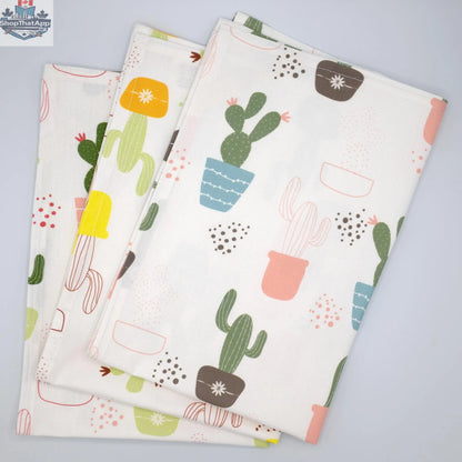 Bright printed kitchen towels featuring cheerful thorny issue design from Hem And Tassel, perfect for adding color to your kitchen.