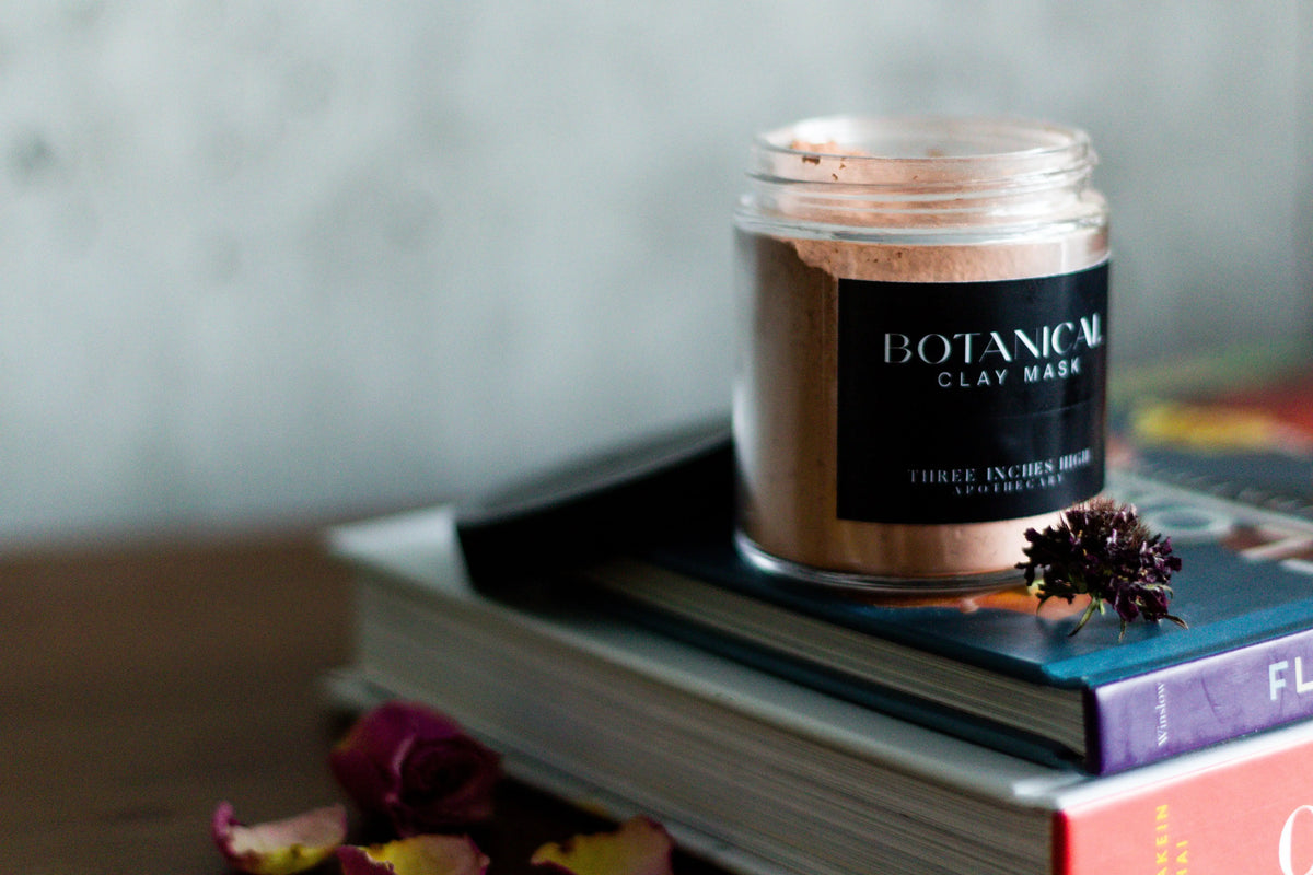 Botanical clay mask from Three Inches High featuring natural clay and botanical ingredients for skincare.