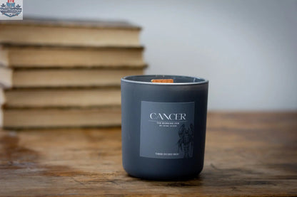 Cancer Awareness candle by Three Inches High, 8oz soy wax candle with zodiac Cancer symbol for support and comfort.