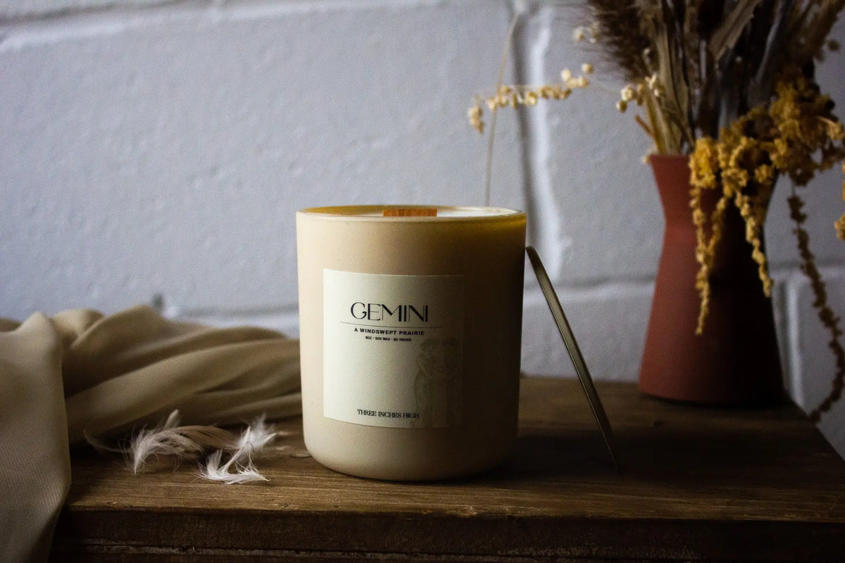 Soy wax candle from Three Inches High with natural scent, 8oz size, in a clear glass jar with a single wick.