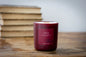 Leo zodiac candle by Three Inches High, 8oz all-natural soy wax candle with a detailed zodiac symbol design.