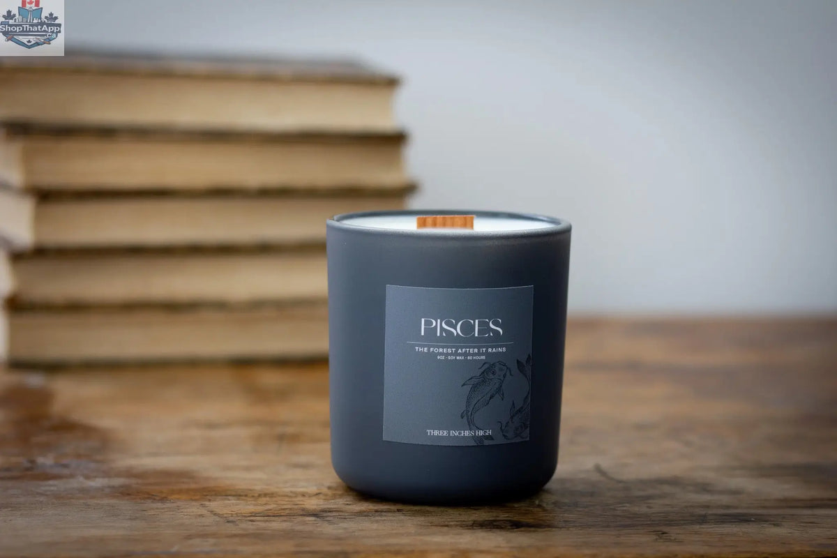 Pisces soy wax candle in an 8oz eco-friendly container with zodiac-themed design, by Three Inches High.