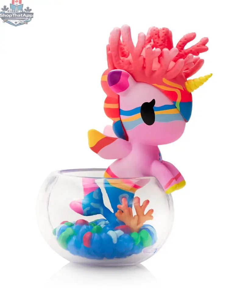 Neon Reef Mermicorno toy from tokidoki's Blind Box collection, featuring vibrant colors and a unicorn-mermaid design.