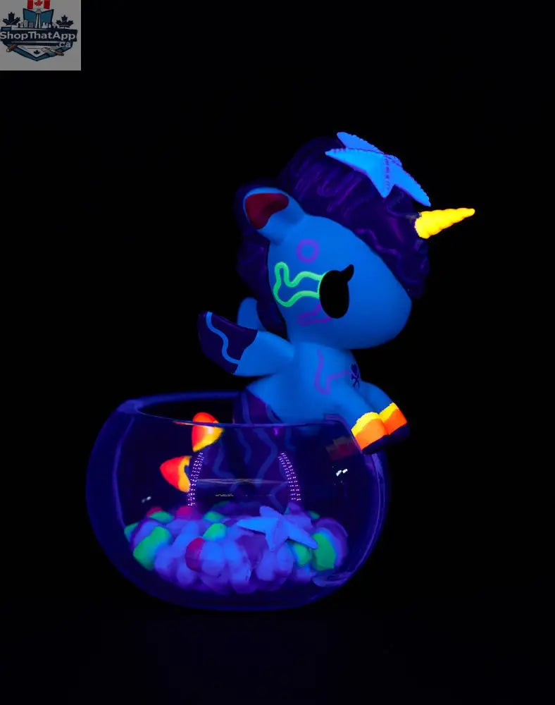 Colorful Neon Reef Mermicorno toy from tokidoki's Blind Box collection, featuring vibrant neon colors and detailed mermaid-inspired design.