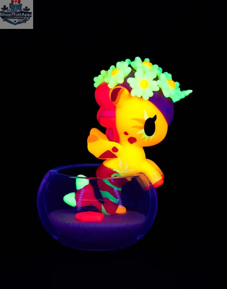 Colorful Neon Reef Mermicorno toy from tokidoki's blind box series featuring vibrant mermaid-inspired character design.