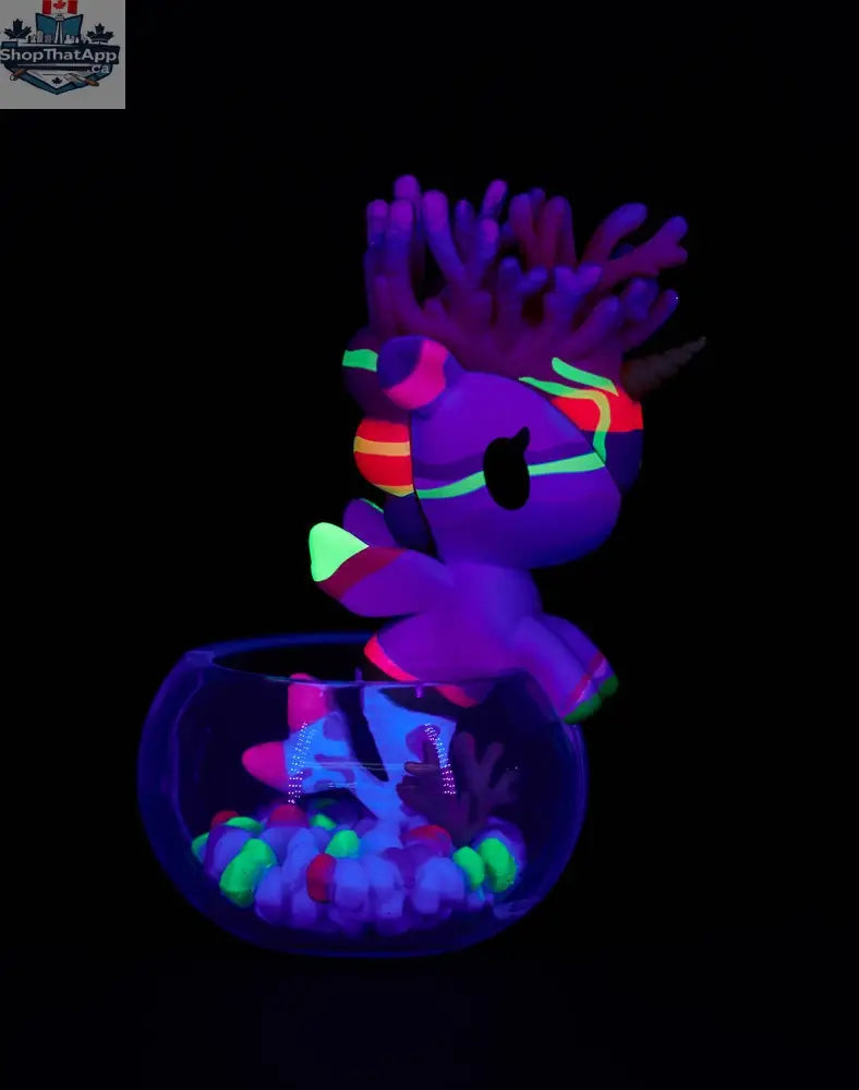 Colorful Neon Reef Mermicorno toy from tokidoki's blind box collection, featuring vibrant aquatic design and detailed character features.