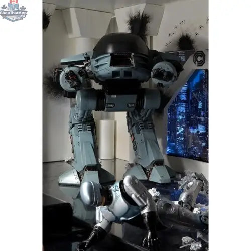 Toy Snowman RoboCop ED-209 action figure with sound, detailed figure from the Neca Deluxe Edition, showcasing robotic design and features.