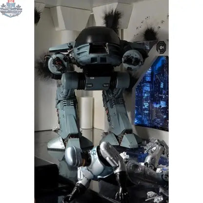 Toy Snowman RoboCop ED-209 action figure with sound, detailed figure from the Neca Deluxe Edition, showcasing robotic design and features.