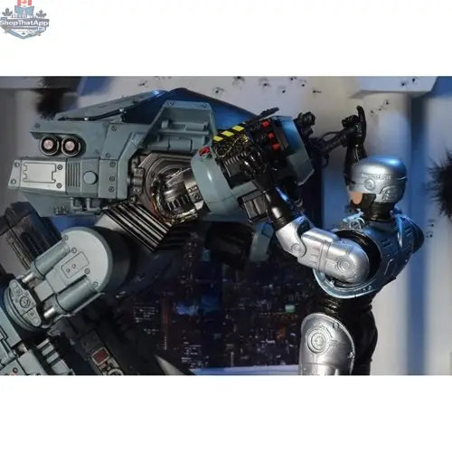 Toy Snowman RoboCop ED-209 action figure with sound, detailed robot toy from the Neca Deluxe Edition, featuring realistic design and poseability.