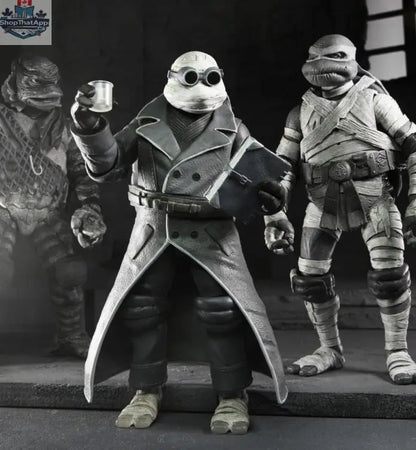 Black and white Teenage Mutant Ninja Turtles action figures in a Toy Snowman Universal Monsters TMNT 4-pack, detailed toy figures.