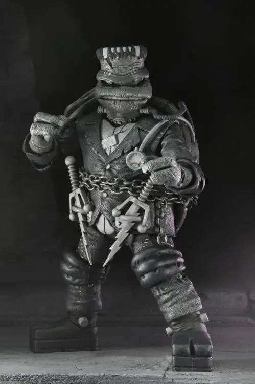 Black and white Teenage Mutant Ninja Turtles action figures from the Toy Snowman Universal Monsters TMNT 4-pack, detailed toy figures.