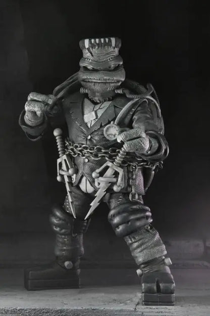 Black and white Teenage Mutant Ninja Turtles action figures from the Toy Snowman Universal Monsters TMNT 4-pack, detailed toy figures.