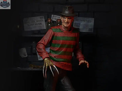 Toy Snowman Freddy Krueger action figure from A Nightmare On Elm Street, featuring detailed costume and iconic glove.