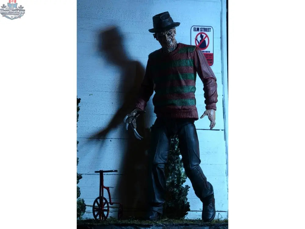 Toy Snowman Nightmare on Elm Street Freddy Krueger action figure, detailed collectible toy with iconic character features.