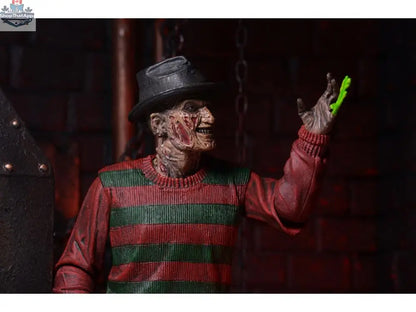 Toy Snowman Freddy Krueger action figure from A Nightmare On Elm Street, detailed collectible toy with iconic horror character features.