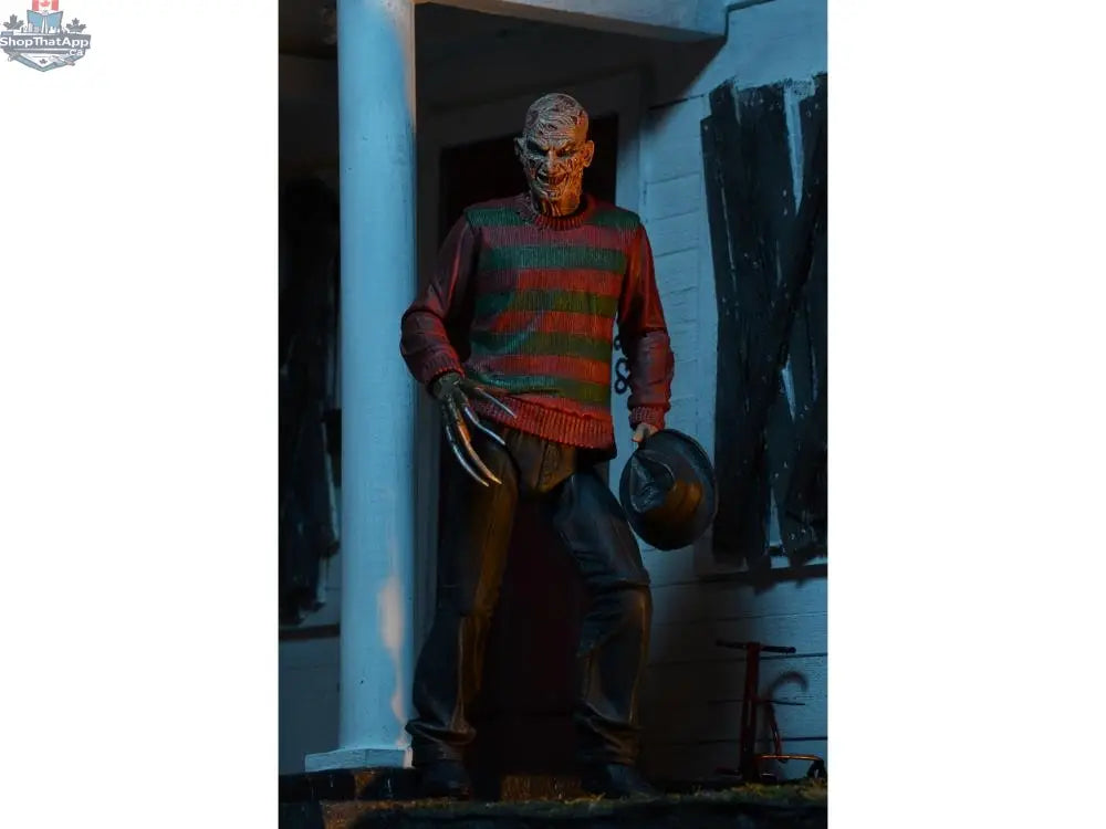 Toy Snowman Nightmare On Elm Street Freddy Krueger action figure from the Ultimate Collectables series, detailed horror movie toy.