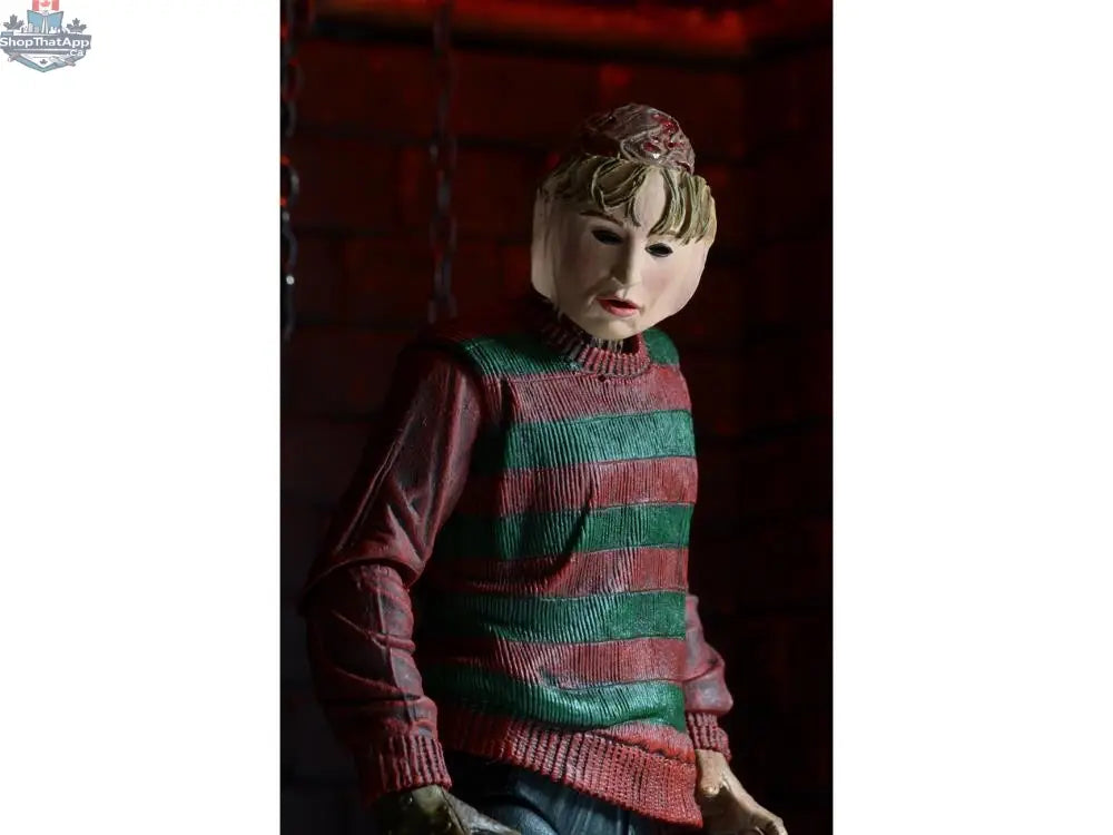 Toy Snowman Nightmare on Elm Street Freddy Krueger action figure, detailed collectible toy from the horror movie series.
