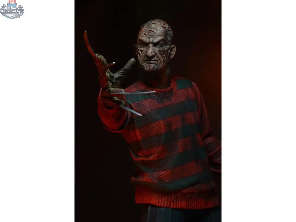 Toy Snowman Nightmare On Elm Street Freddy Krueger action figure with detailed costume and menacing facial expression.