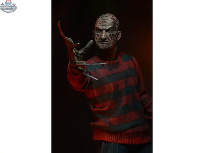 Toy Snowman Nightmare On Elm Street Freddy Krueger action figure with detailed costume and menacing facial expression.