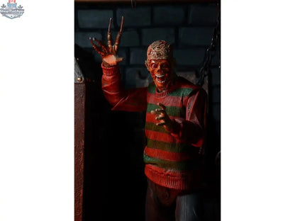 Toy Snowman Nightmare on Elm Street Freddy Krueger action figure, collectible toy with detailed costume and iconic blade glove.