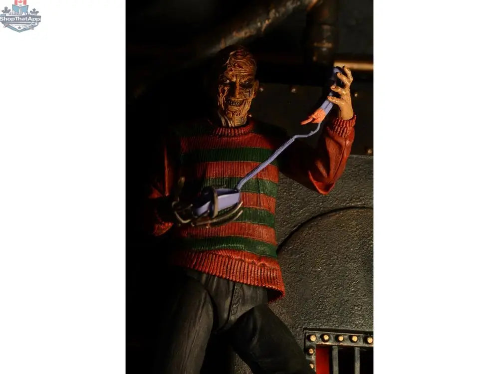 Toy Snowman Nightmare On Elm Street Freddy Krueger action figure, collectible toy with detailed costume and facial features.