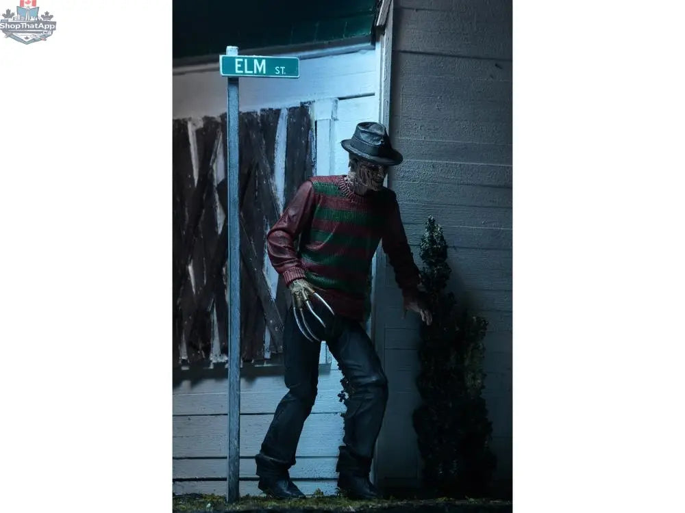 Toy Snowman Freddy Krueger action figure from A Nightmare On Elm Street, detailed collectible toy with iconic horror character features.