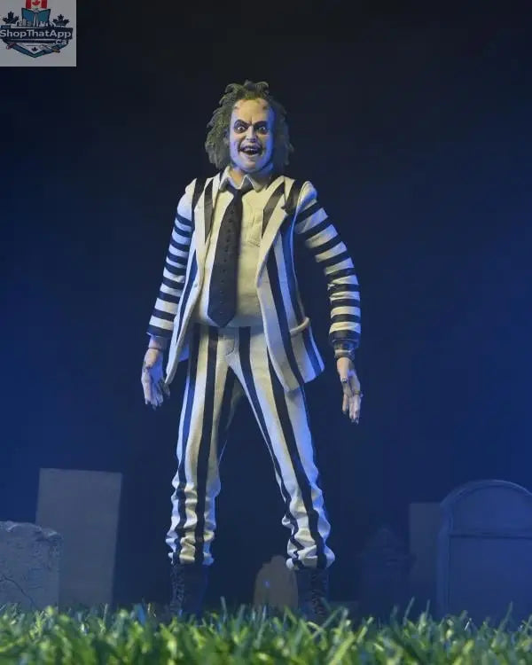 Beetlejuice action figure in black and white suit, Toy Snowman collectible toy, detailed figure with iconic costume and facial features