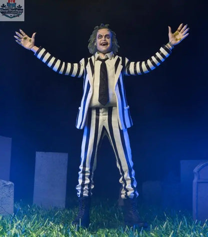 Beetlejuice action figure in black and white suit, Toy Snowman collectible toy with detailed costume and expressive face.