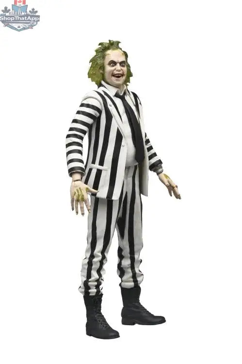Black and white Beetlejuice action figure by Toy Snowman, detailed collectible toy in classic character costume.