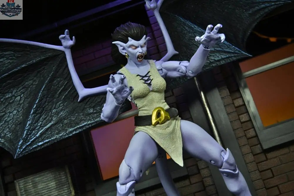 Toy Snowman Neca Disney Gargoyles Angela action figure, detailed collectible toy from the Gargoyles series, showcasing her wings and costume.