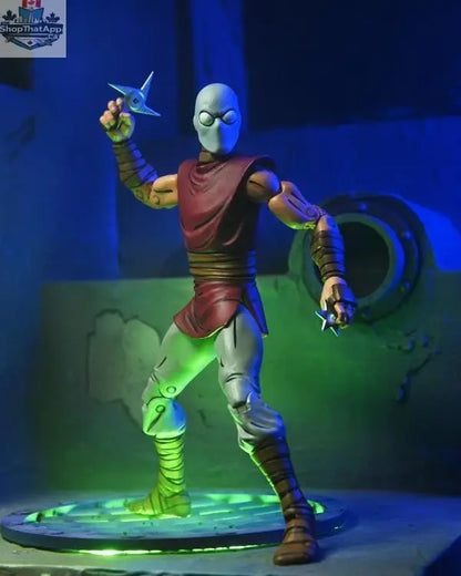 Teenage Mutant Ninja Turtles Foot Ninja action figure in classic colors, Toy Snowman collectible toy from Mirage Comics series.