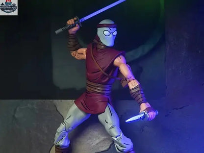 Teenage Mutant Ninja Turtles Foot Ninja action figure in classic colors, Toy Snowman collectible toy from Mirage Comics series.
