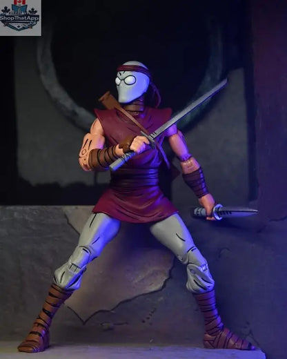 Teenage Mutant Ninja Turtles Foot Ninja action figure in classic colors from Mirage Comics, collectible Toy Snowman toy with detailed design.