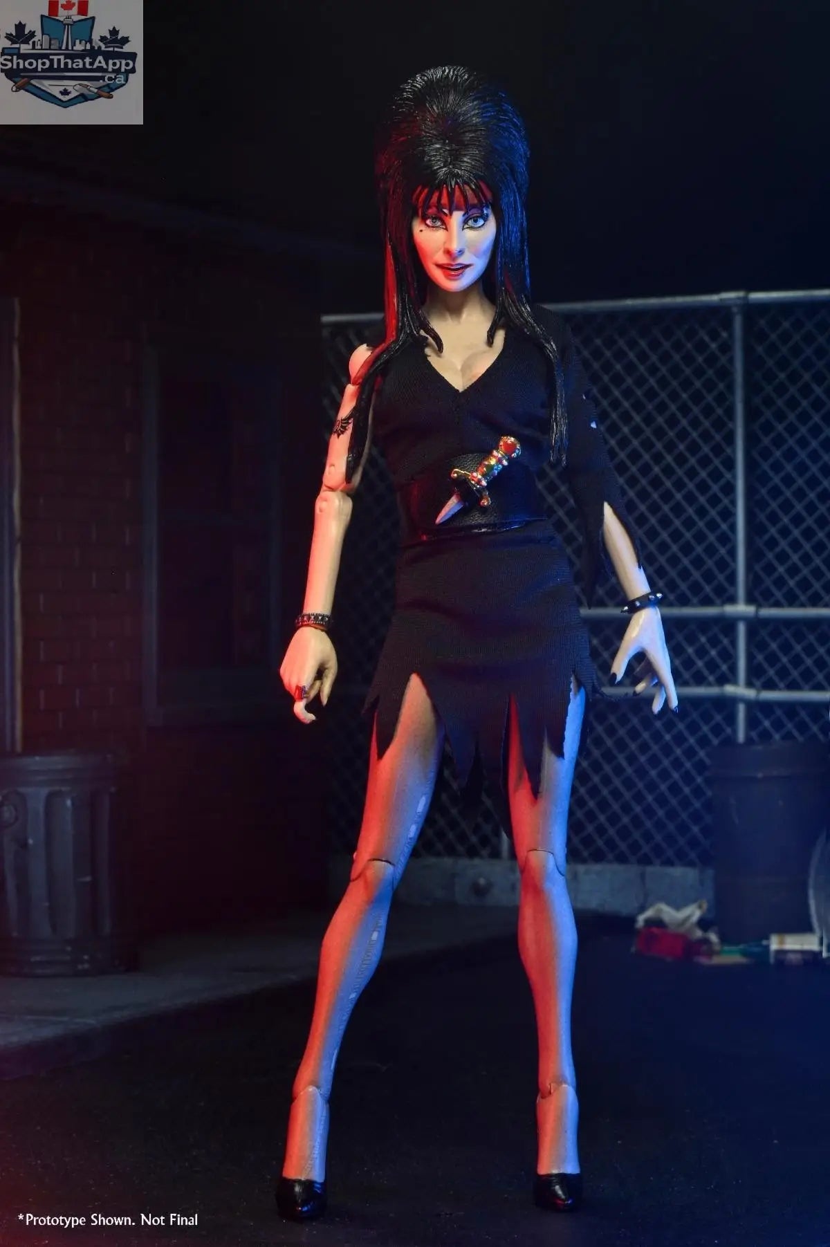 Elvira action figure by Toy Snowman, 8-inch clothed commando toy, detailed collectible figure in combat attire.