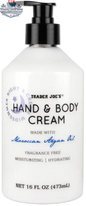 Trader Joe's hand and body cream with Moroccan Argan Oil by Vancou-Vert Trading Ltd., in a 473mL jar, showing the cream's smooth texture.