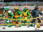 Four Teenage Mutant Ninja Turtles action figures from Toy Snowman, featuring detailed comic-style designs in a collectible set.
